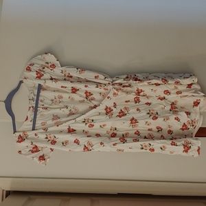 Hollister romper. Size large. White with pink flowers.